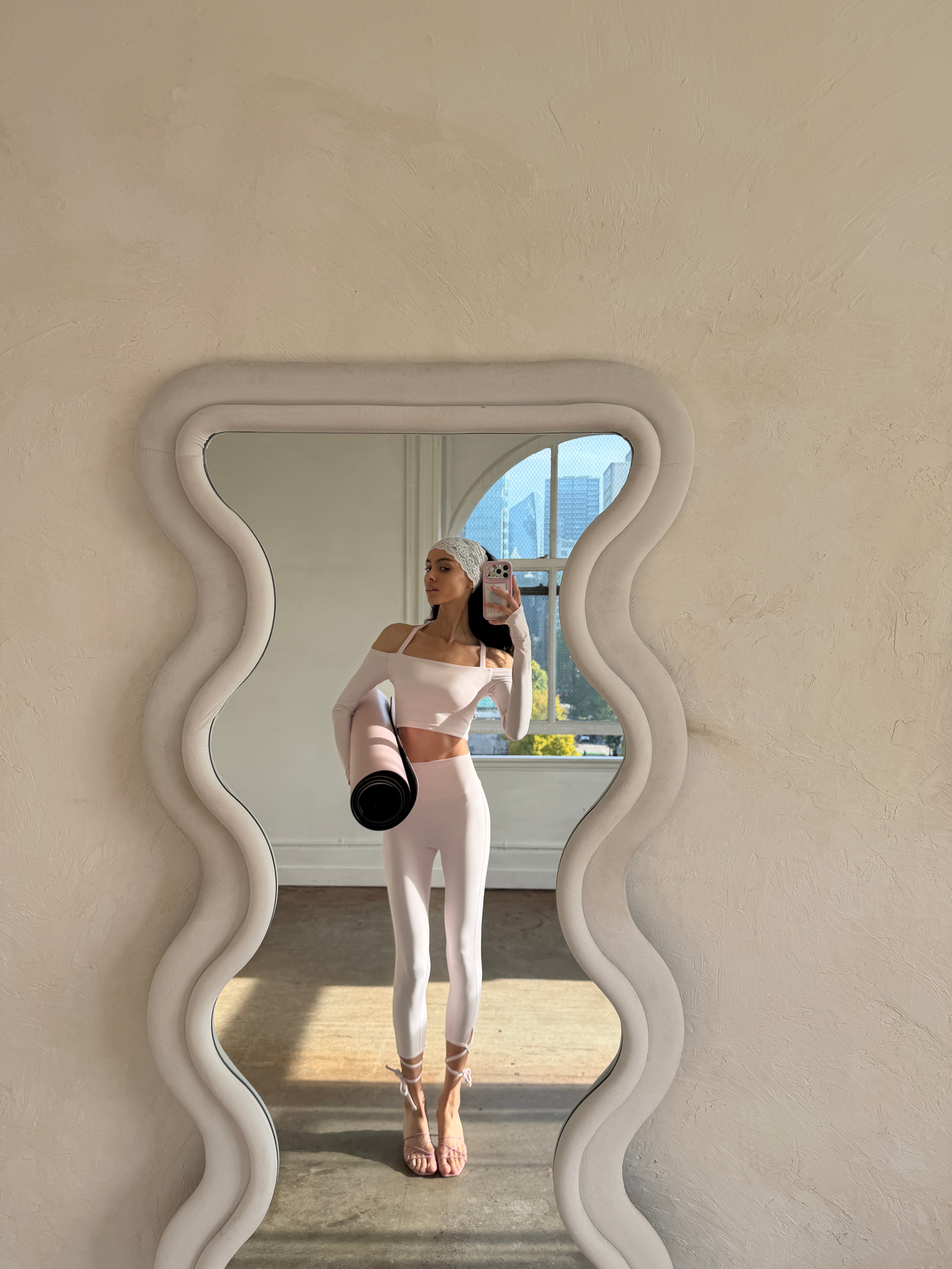 odette set: off-the-shoulder top and bow leggings in porcelain pink by plové